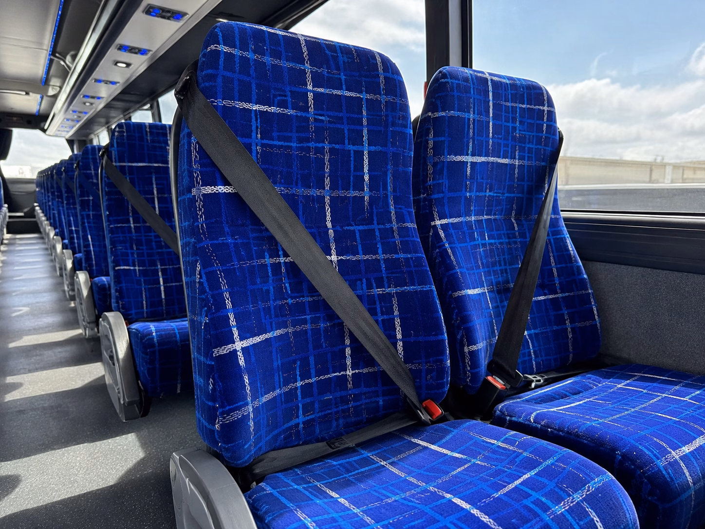 how starting location and deadhead affect charter bus rates in apex